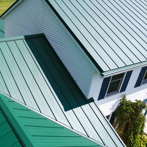 <div><h4>26-Gauge Standing Seam Metal Roof</h4><p><b>Manufacturer:</b> Cavalier Metal Roofing</p><p><b>Location:</b> Ohio, US</p><p><b>Style:</b> Vertical Panel/Standing Seam</p><p><b>Material:</b> Steel</p><p><b>Color:</b> Green</p><p><a href="/gallery/image-detail/1272/" class="link-arrow text-uppercase theme-color--orange" data-toggle="modal" data-target="#detailModal_gallery_image_grid_lamlejqhdgHs">View More</a></p></div>