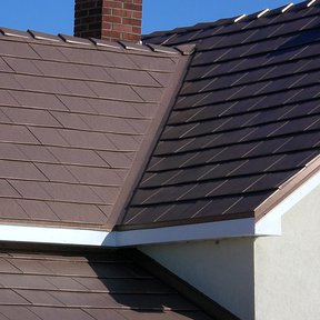 <div><h4>Classic Metal Roofing Oxford, Aged Bronze color</h4><p><b>Manufacturer:</b> Classic Metal Roofing Systems</p><p><b>Style:</b> Metal Slate/Shingle</p><p><b>Color:</b> Brown</p><p><a href="/gallery/image-detail/37/" class="link-arrow text-uppercase theme-color--orange" data-toggle="modal" data-target="#detailModal_gallery_image_grid_lamlejqhdgHs">View More</a></p></div>