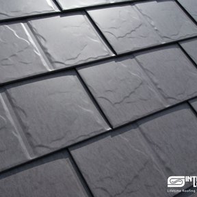 <div><h4>Weathered Grey Interlock Slate</h4><p><b>Manufacturer:</b> Interlock Roofing Ltd.</p><p><b>Style:</b> Metal Slate/Shingle</p><p><b>Color:</b> Gray</p><p><a href="/gallery/image-detail/259/" class="link-arrow text-uppercase theme-color--orange" data-toggle="modal" data-target="#detailModal_gallery_image_grid_lamlejqhdgHs">View More</a></p></div>
