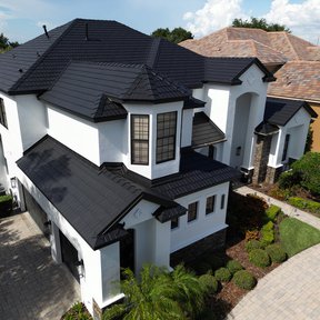 <div><h4>A Metal Roof to last</h4><p><b>Manufacturer:</b> Vicwest Building Products</p><p><b>Location:</b> Florida, US</p><p><b>Style:</b> Metal Shake</p><p><b>Material:</b> Aluminum</p><p><b>Color:</b> Black</p><p><a href="/gallery/image-detail/1342/" class="link-arrow text-uppercase theme-color--orange" data-toggle="modal" data-target="#detailModal_gallery_image_grid_lamlejqhdgHs">View More</a></p></div>