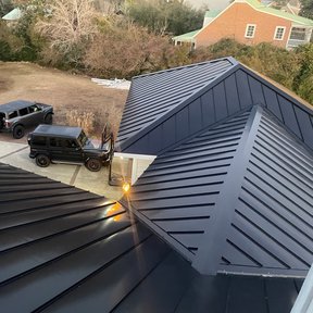 <div><h4>Matte Black Metal Roof</h4><p><b>Manufacturer:</b> 50 North Roofing Company</p><p><b>Location:</b> North Carolina, US</p><p><b>Style:</b> Vertical Panel/Standing Seam</p><p><b>Material:</b> Aluminum</p><p><b>Color:</b> Black</p><p><a href="/gallery/image-detail/1256/" class="link-arrow text-uppercase theme-color--orange" data-toggle="modal" data-target="#detailModal_gallery_image_grid_lamlejqhdgHs">View More</a></p></div>
