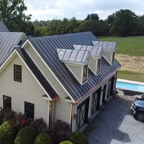 <div><h4>Willisville Road job</h4><p><b>Manufacturer:</b> Peak Roofing Contractors, Inc.</p><p><b>Location:</b> Virginia, US</p><p><b>Style:</b> Vertical Panel/Standing Seam</p><p><b>Material:</b> Steel</p><p><b>Color:</b> Brown</p><p><a href="/gallery/image-detail/1254/" class="link-arrow text-uppercase theme-color--orange" data-toggle="modal" data-target="#detailModal_gallery_image_grid_lamlejqhdgHs">View More</a></p></div>