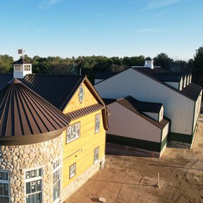 <div><h4>Curved Roof</h4><p><b>Manufacturer:</b> Advanced Metal Roofing LLC</p><p><b>Location:</b> New Hampshire, US</p><p><b>Style:</b> Vertical Panel/Standing Seam</p><p><b>Material:</b> Steel</p><p><b>Color:</b> Brown</p><p><a href="/gallery/image-detail/1329/" class="link-arrow text-uppercase theme-color--orange" data-toggle="modal" data-target="#detailModal_gallery_image_grid_lamlejqhdgHs">View More</a></p></div>
